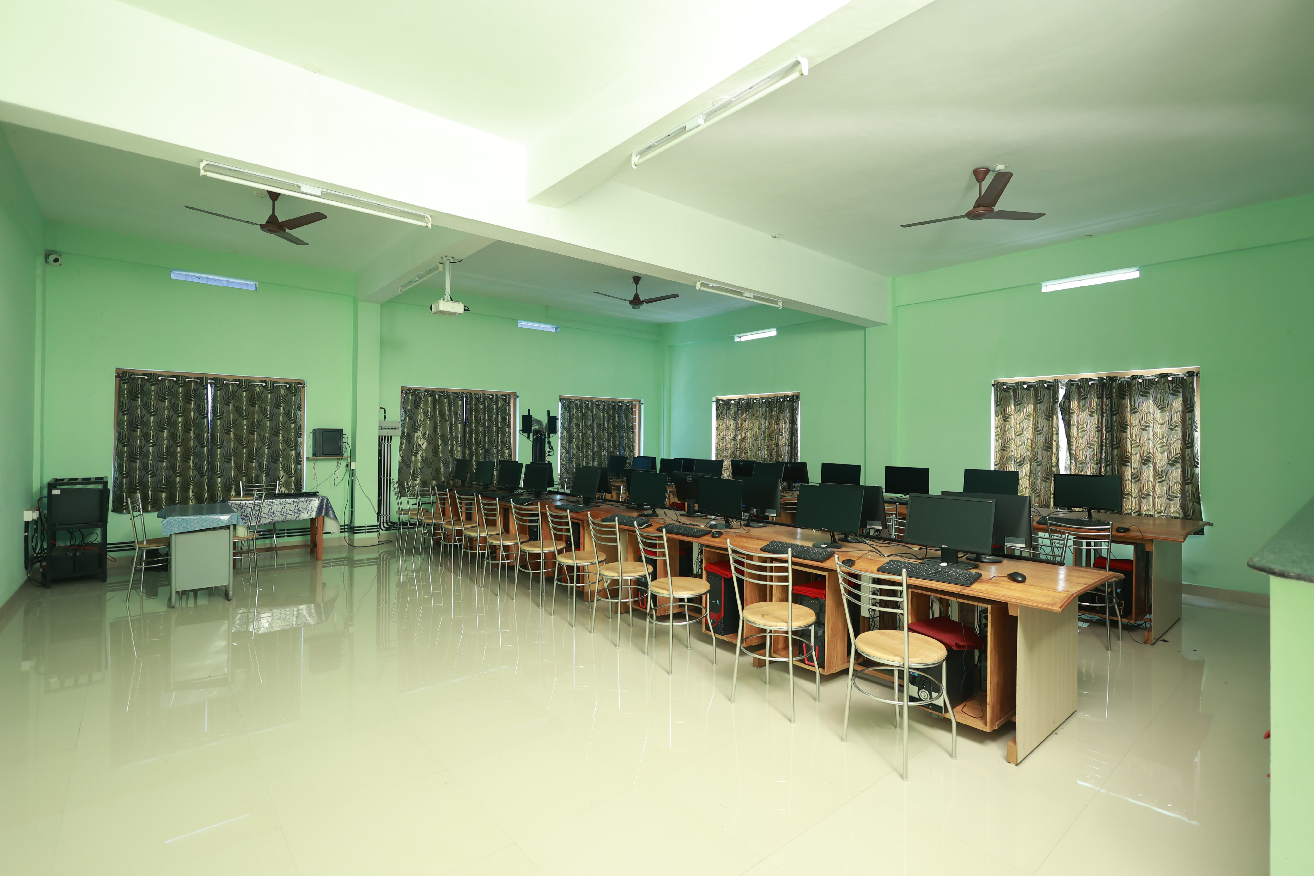 Faculty members conducting a workshop at Carmelgiri College